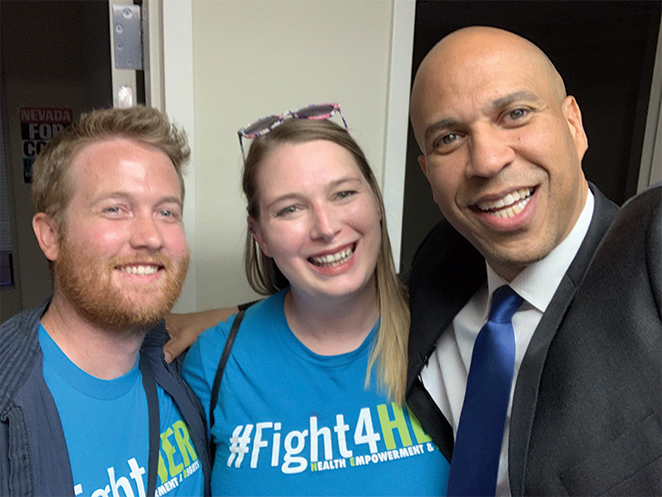 selfie of two activits with Sen. Cory Booker