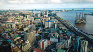 Business district in Lagos, Nigeria. In 2021, the population of Lagos proper is estimated at 14,862,111—representing a 3.44% annual change since 2015.