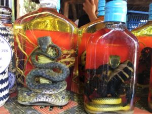 Bottles of snake wine for sale at a market in China. 