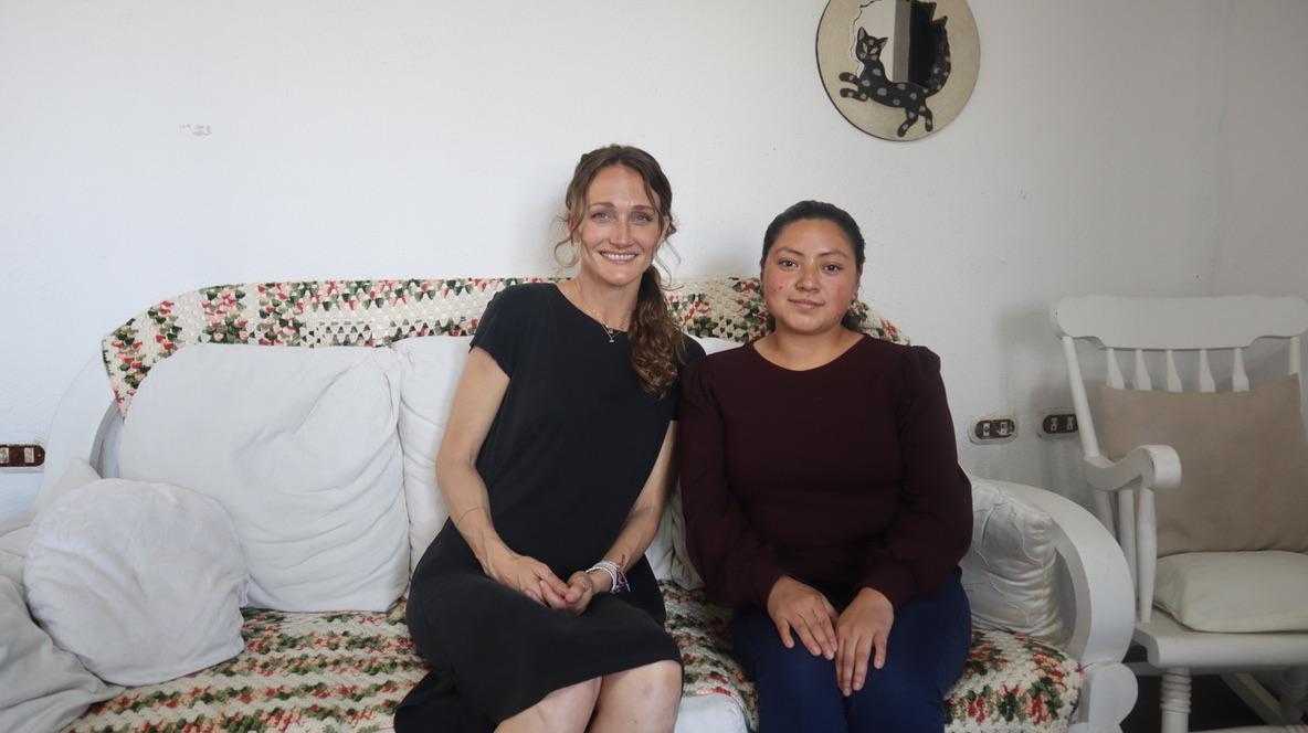 Hannah with Miriam, a student midwife at Manos Abiertas headquarters.