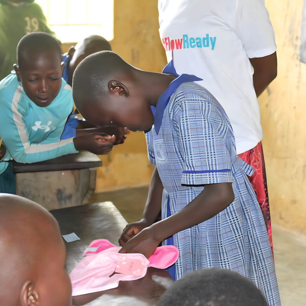 Young Girl FlowReady Demo at Makembo Primary