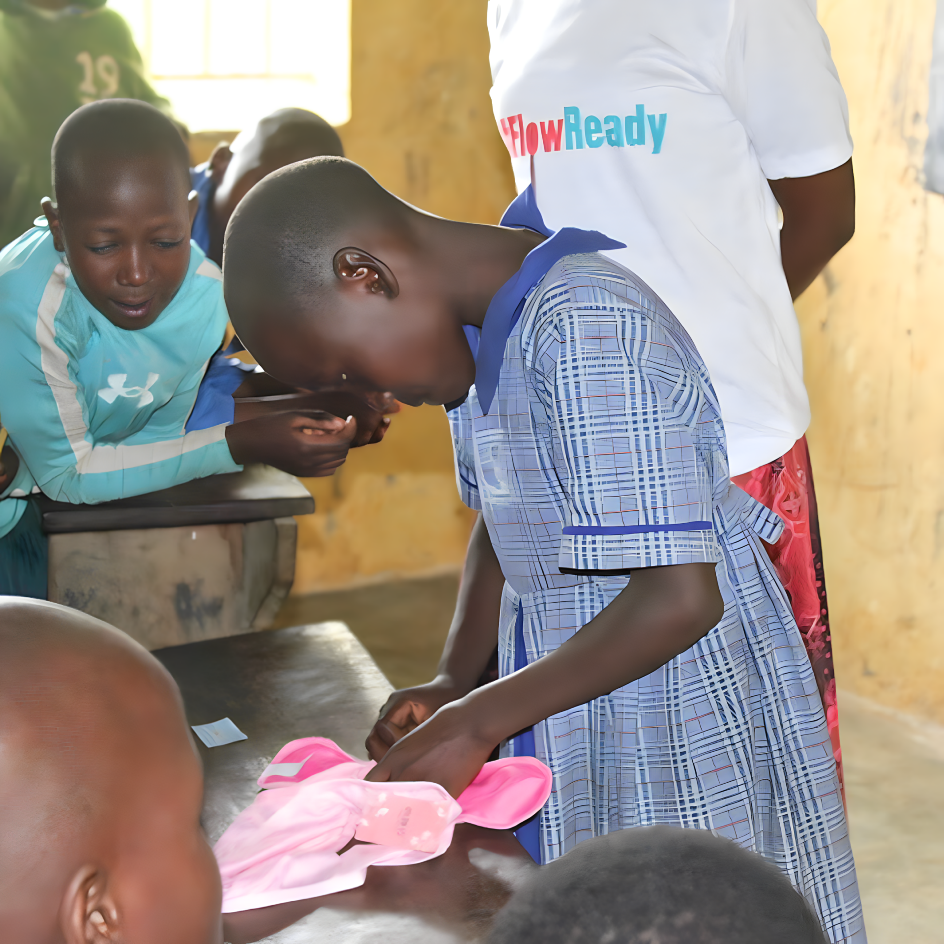 Young Girl FlowReady Demo at Makembo Primary