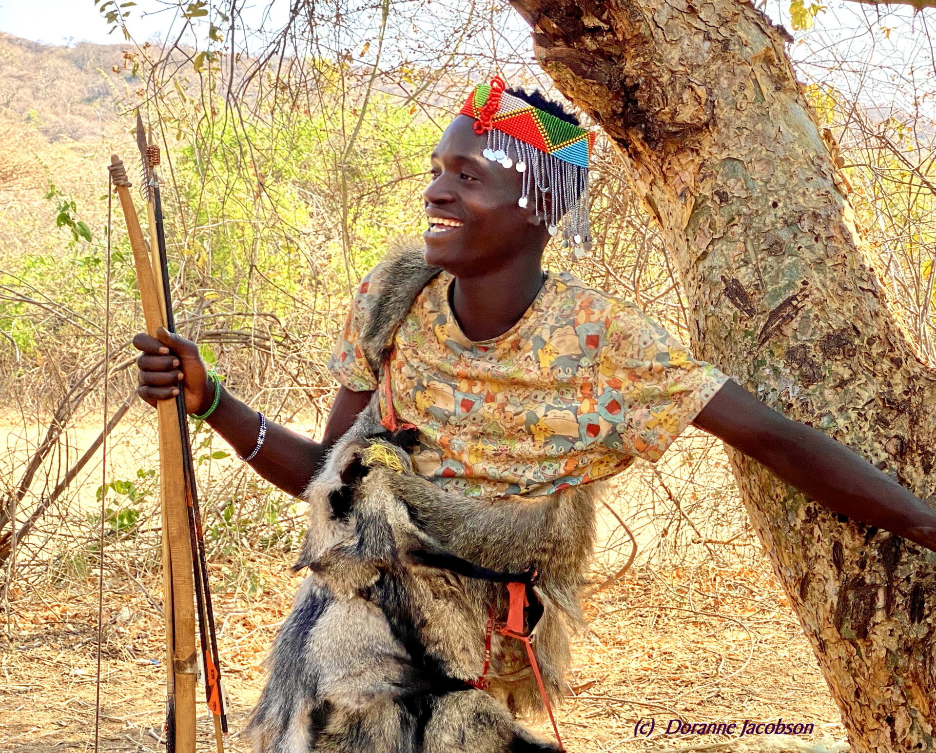 A hunter of the Hadza (Hadzabe) tribe laughs at a joke. Submitted by: Doranne Jacobson