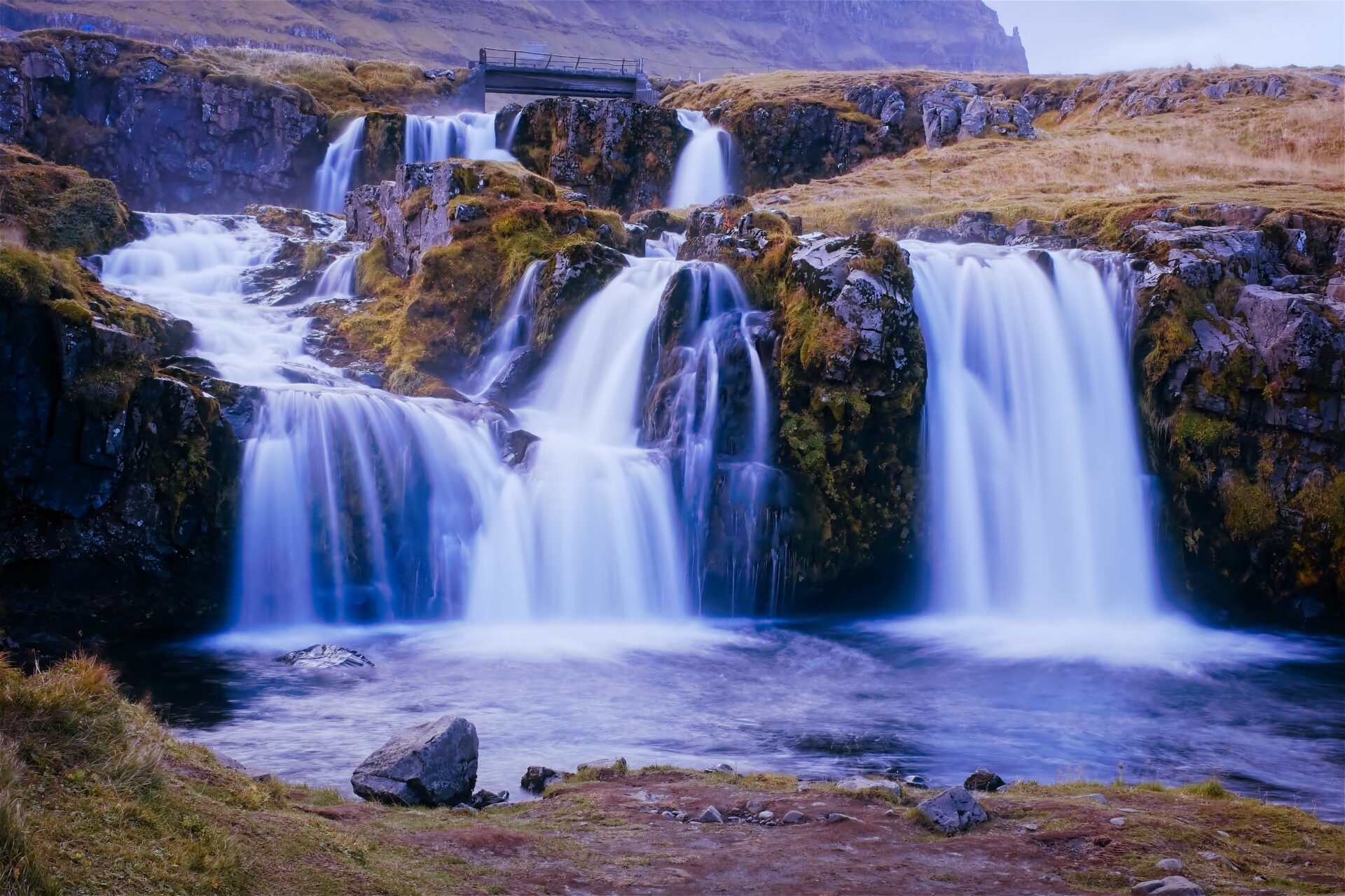 A bridge overlooking falls at Kirkjufellfoss on the Snaefellsnes Peninsula in Iceland. Submitted by: Paul Wilson