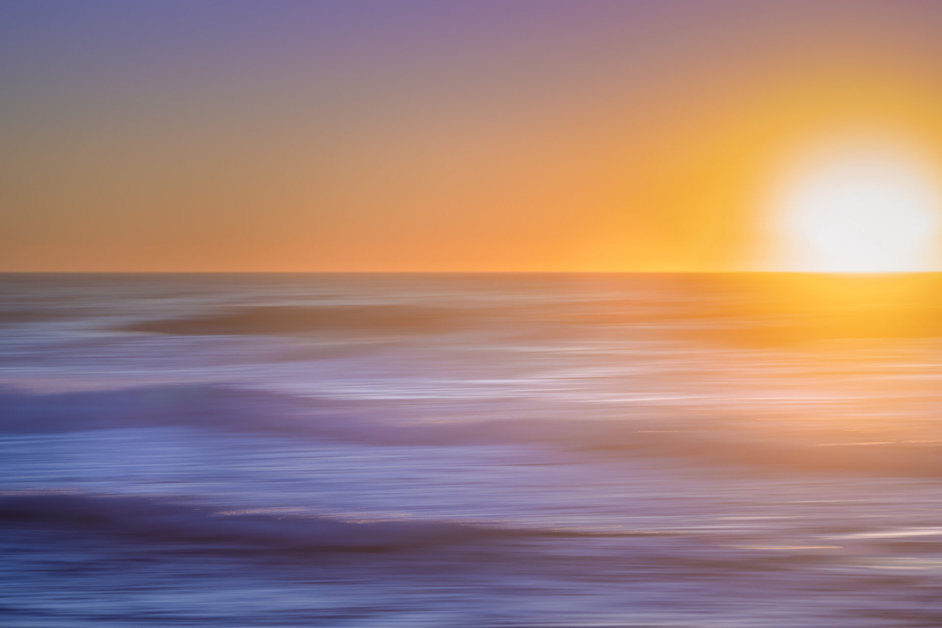This shot was created with a long exposure and a horizontal pan of the camera to create the motion blur effect. Sunset at Garapata Beach, California. Submitted by: Steve Harris