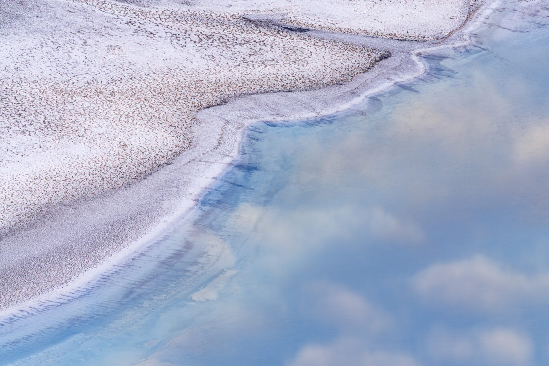 Salt flats and clouds reflected off Lake Manly in Death Valley. Photo taken from Dante's View at around 6,000' elevation. Submitted by: Steve Harris