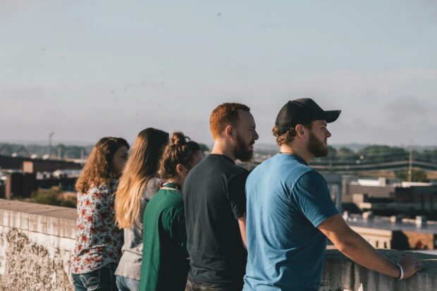 Five young people looking out over city