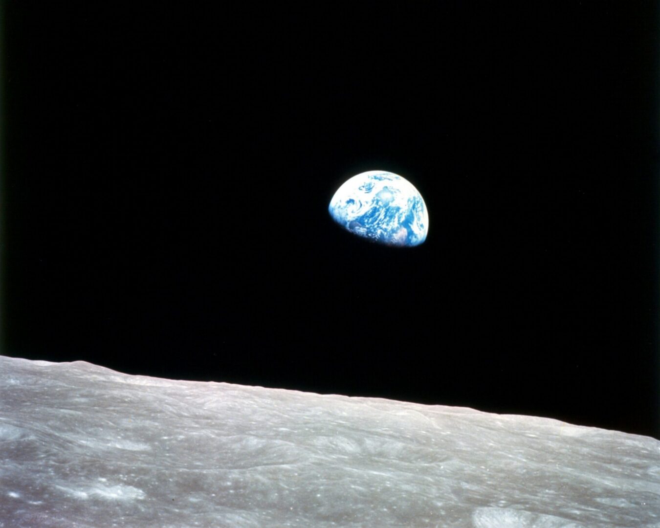 Earthrise—the rising Earth greeted the Apollo 8 astronauts on December 24, 1968 as they came from behind the Moon after the fourth nearside orbit